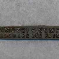 Bottle / can opener from C. Muzzi, Hardware & Paints, 104-106 Jefferson St, Hoboken.