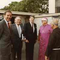          foreground, l-r: Gov. Kean; Sinatra, President Reagan, Archbishop Gerety
   