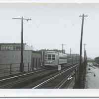 B+W photo of Public Service streetcar on elevated line, Hoboken, 1945.