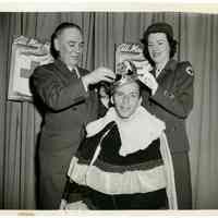 Sinatra photo: Frank Sinatra trying on robe for March 15th Beer Festival, in Park Ave. Restaurant, N.Y., March 13, 1950.