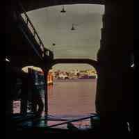 Color slide of eye-level view of the Hudson River and New York City looking E from inside the Lackawanna Terminal