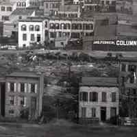          detail 3, lower center: houses; business signs
   