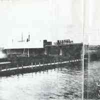 B+W photocopy of composite photo of the north side of the 14th Street ferry terminal looking southwest, Hoboken, Nov. 3, 1942.