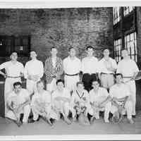 B+W group photo of a tennis team inside a shipyard building, Hoboken, no date, ca. 1935