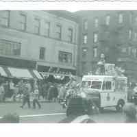 B+W photo of Hostess Cake delivery trucks in Hoboken Centennial celebration parade on Washington St. near 2nd St. in Hoboken,1955.