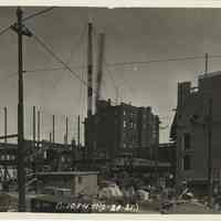 Sepia-tone photo of steel frame erection on the site for the Fabian Theatre, southeast corner of Newark & Washington Sts., Hoboken, Feb.21, 1928.