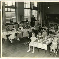          Digital image of b&w photo of elementary (kindergarten?) school class celebrating Thanksgiving at school; from the Giancaspro family of Hoboken, Hoboken, n.d., ca. mid-1950s. picture number 6
   