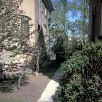 Color slide of the southern exterior and landscaped yard of 907 Castle Point Terrace, Hoboken, May, 1972.