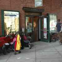          0541: museum walkway entrance, showing baby stroller parking for event
   