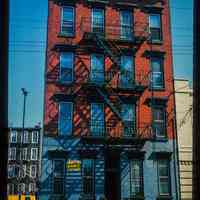          Color slide of eye-level view of façade and fire escape of unidentified address on Jackson between 1st & 2nd picture number 1
   