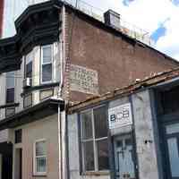 Photos, 2, of painted sign, Boot Black Parlor Shoe Polish 5 cents, on wall at 519 Adams St., Hoboken, taken Apr. 14, 2008.