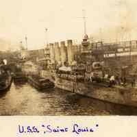 Sepia-tone photo of U.S.S. Saint Louis, U.S. Army Transport Service Pier No. 3, Port of Embarkation, Hoboken, n.d., ca. April 17 - 24, 1918.