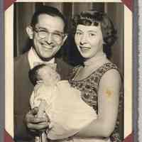 Black-and-white photo of Michael Samperi, wife (not yet identified) and young baby, probably Hoboken, no date, circa 1950.