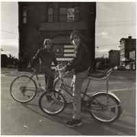 B+W photo of two boys with bicycles in front of fire house at Newark St. & Observer Highway, Hoboken, no date, [1976].