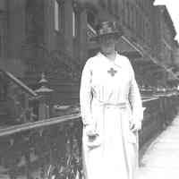 B+W negative image of Mrs. Frank K. Markey (Mary Henry Miller) in Red Cross uniform, no place, no date, ca. 1918-1921.