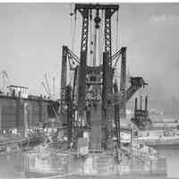 B+W photo: Crane barge in dry dock area, Hoboken, no date, ca. 1940.