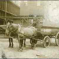 Sepia-tone photo of Jagels & Bellis wagon with driver, 15th & Hudson Sts., Hoboken, n.d., ca. 1895-1910.