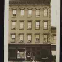 B&W photo of mixed-use row house apartment building at unknown location in New Jersey.