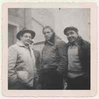 Black-and-white photo of Marlon Brando with Joey Lisa (left) & "Dice" (right), Pier C, Hoboken, during filming of On the Waterfront, Hoboken, no date, ca. late 1952-early 1953.