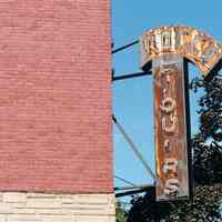 Color photo of the hanging sign for Rocco Liquors, 600 Clinton Street, Hoboken, Sept., 1-5, 2001.