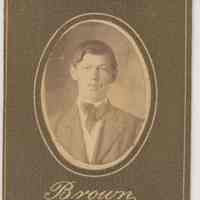 Sepia-tone photo of an unidentified boy posed in studio, Hoboken, no date, ca. 1890-1910.