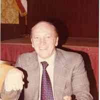 Digital image of color photo of Mayor Steve Cappiello seated at dinner or banquet, Hoboken?, no date, ca. 1980