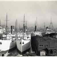 B+W photo of 4 ships at berth and one in a dry dock, Hoboken, no date, ca. 1940.