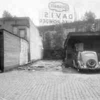 B+W photo of the Cocomalt, Davis Baking Powder sign, Hoboken, 1949.