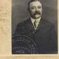          detail photo of Willy G. Keuffel, president of K&E with 1889 corporate seal
   