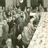 B+W group photo of the testimonial dinner for Harry D. Bingham by his co-workers upon his retirement, Meyers Hotel, Hoboken, September 14, 1951.