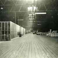 Digital image of black-and-white photo of the interior of the Pier 16 shed, Hoboken Dock Company, Hoboken, no date, ca. 1945-51.