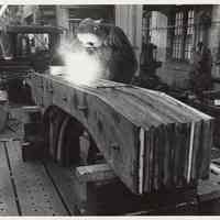 B+W photo of welding new stern frame for MV Grand Justice, machine shop, Bethlehem Steel Shipyard, Hoboken, n.d., ca. March 1975.