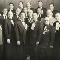 Sepia-tone photo of Society of Madonna Dei Martiri officers & committee members for Feast, Hoboken, n.d., ca. 1935-1937.