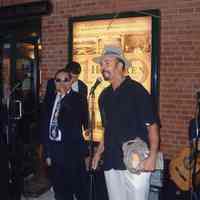 Color photo of party in Hoboken Historical Museum walkway celebrating the publication of Tom Olivieri oral history chapbook, May, 2005.