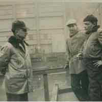 B+W candid photo of "On the Waterfront" filming in Hoboken: Elia Kazan is at the left, Hoboken, no date, ca. late 1953-early 1954.