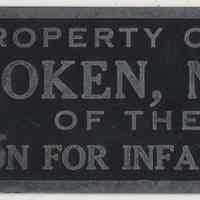 Sign plate: Property of City of Hoboken, N.J. Chapter of the National Foundation for Infantile Paralysis, Inc.