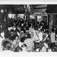 B+W photo of Tom Vezzetti supporters outside his campaign headquarters, 536 Washington St., on election night, Hoboken, [June 11, 1985].