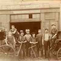 Digital copy of a sepia-tone photo of workshop exterior of Joseph Kostelecky, Carriage and Wagon Manufacturer, Hoboken, no date, ca. 1900-1910.