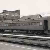 B+W photo of Erie [Lackawanna] Railroad passenger car R25, Hoboken yard, May 25, 1974.