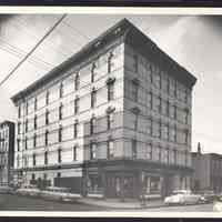 B&W photo of mixed-use apartment building at 2401 Central Avenue, Union City.