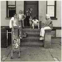 B+W photo of people on a stoop, Hoboken, no date, [1976].