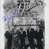 B+W photo of Frank Sinatra & 4 other Rat Pack members posed outside Sands marquee sign, Las Vegas, NV, ca. Jan. 1960; reputedly signed by all.