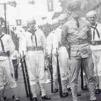 B+W digital print of naval servicemen and officer lined up for parade, Hoboken, no date, ca. 1943-1945.