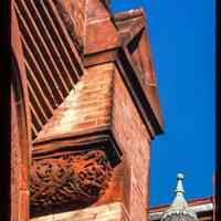          Color slide of detail view of brick pediment and turret on the First Baptist Church at 901 Bloomfield on the corner of Bloomfield and 9th picture number 1
   