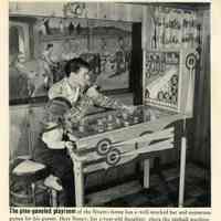          detail pg 60, top photo: Sinatra & daughter Nancy at pinball machine
   