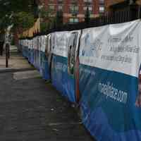 Digital color image of the Maxwell House Coffee plant site with printed vinyl fence sign banners, Hoboken, October 2004.