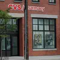 Color photos, 16, of backlit marquee HHM signs inside windows of CVS Pharmacy, 14th St. & Park Ave., Hoboken, June 1, 2007.