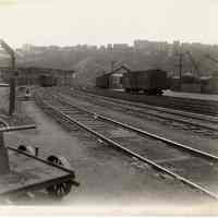 B+W photo looking west on 17th St. from west of Willow Ave.; freight rail tracks & crossing, Hoboken, n.d., (1927).