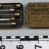 Tin: Five Commercial Auto Fuses; 3 A 20 Amp. Commercial Enclosed Fuse Co., Hoboken, N.J. Original contents present. N.d., ca. late 1920s-1940s.