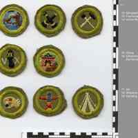          group 4: 8 boy scout merit badges, front view; turned edges
   